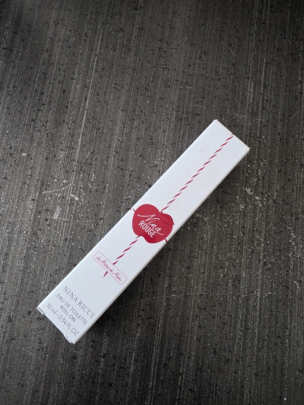 Nina Ricci Rollerball Fragrance - White & Red Packaging